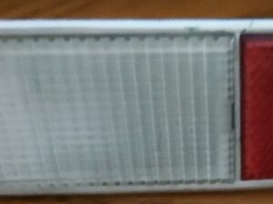 Door courtesy light cover